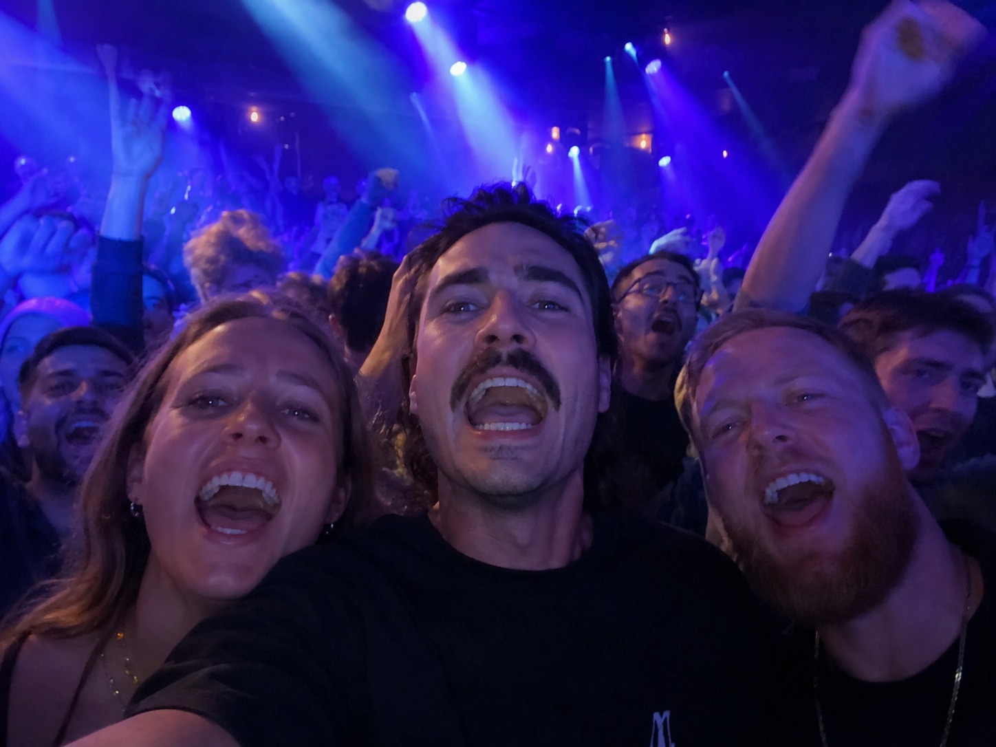 Crowd singing along at a SingAlong Club event